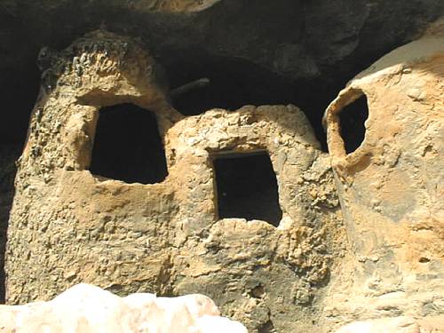 This is a close-up picture of the windows to one of the cliffside dwellings in the village of Teli in Dogon Country.